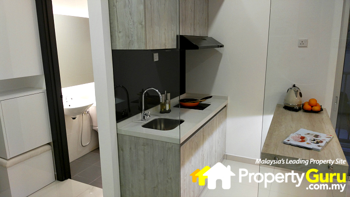 013 The Edge Residen - Type Aâs kitchen area where the cooking hood and hob, and kitchen cabinets are given.